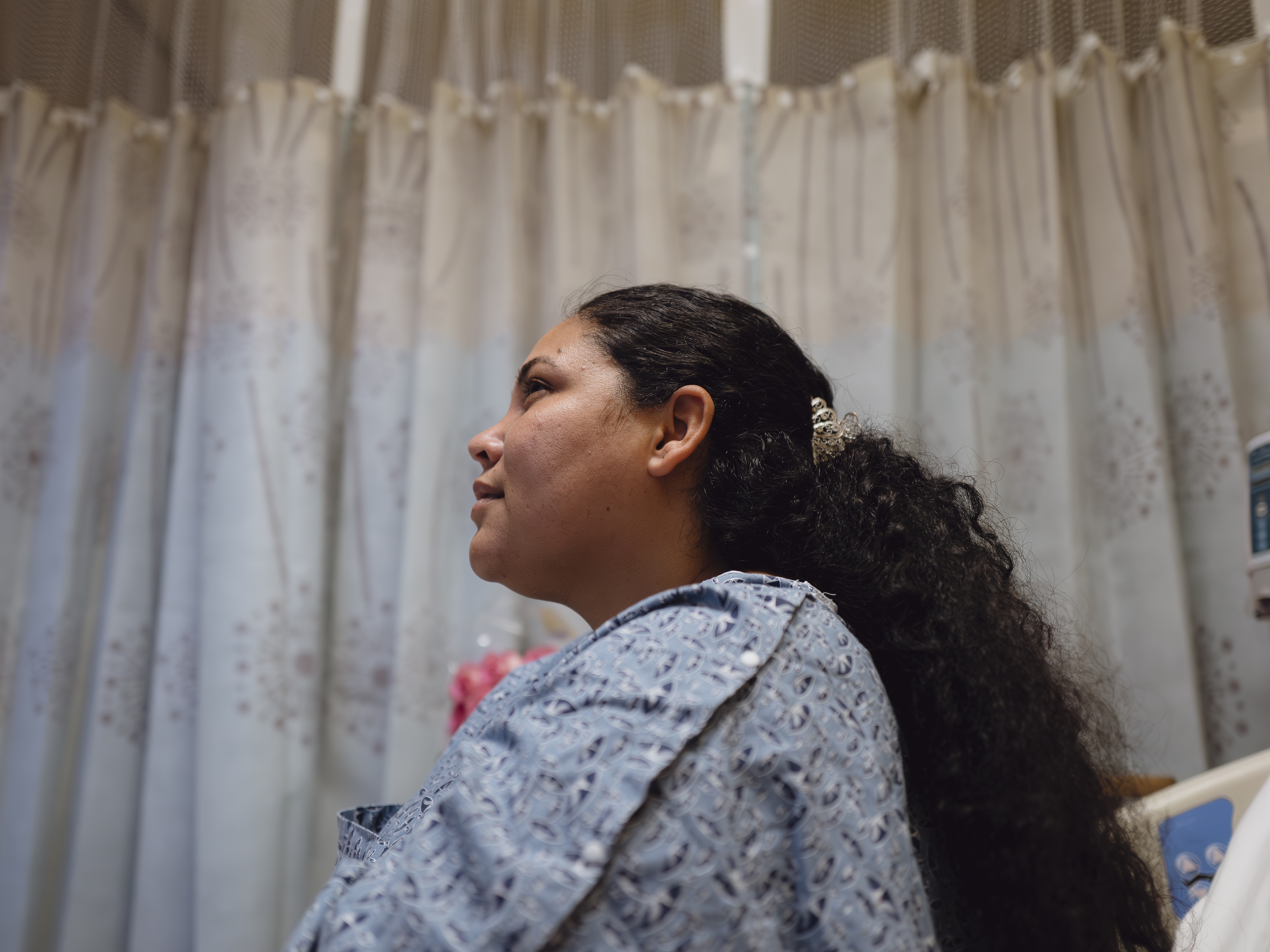 caption: One day before her court hearing, Yasmelin Valazquez is hospitalized at John F. Kennedy Memorial Hospital in Indio, Calif., on April 9, 2025. Zaydee Sanchez/NPR