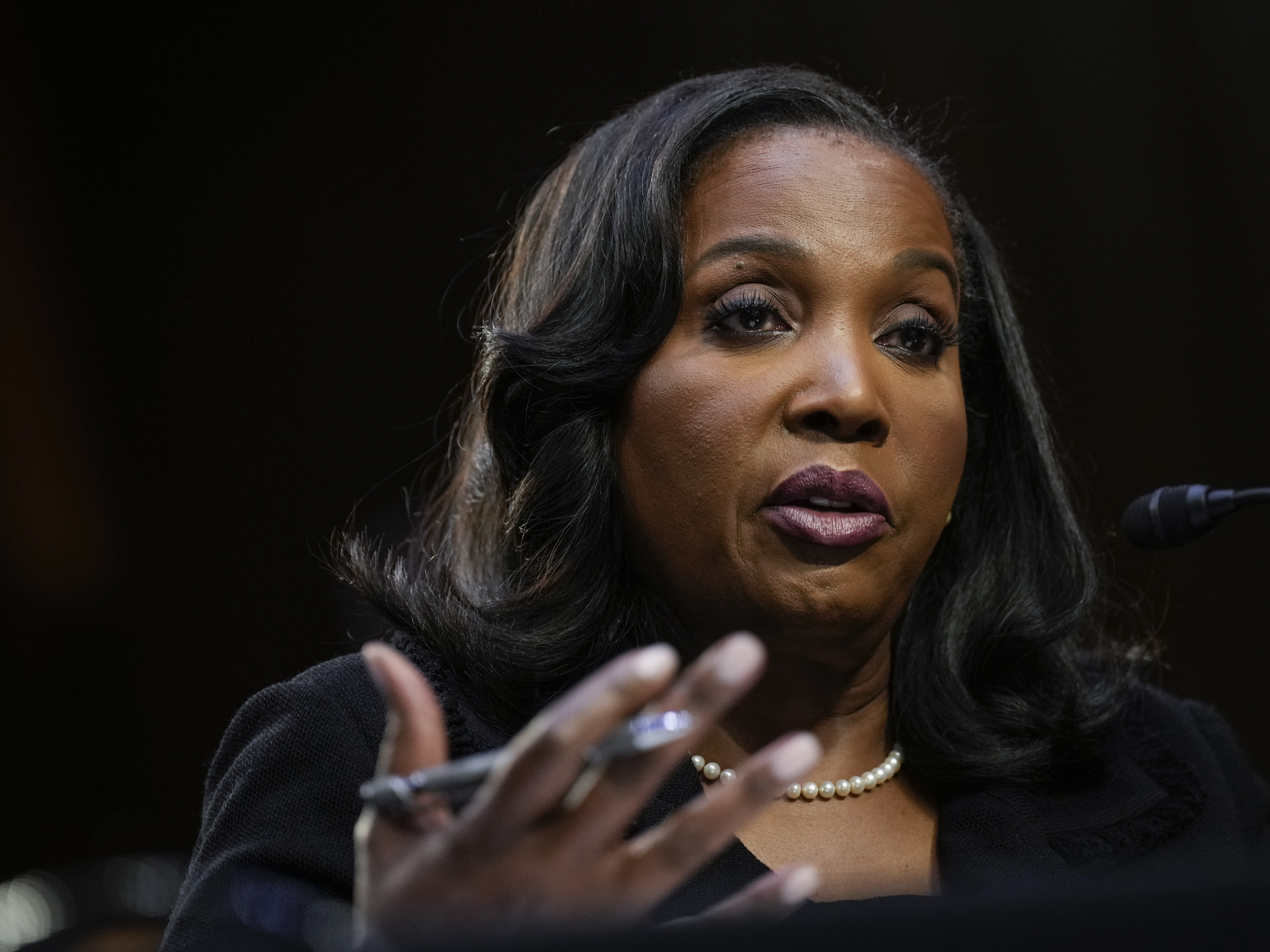caption: Lisa Cook testifies during her Senate Banking nomination hearing in Washington, D.C., on June 21, 2023.