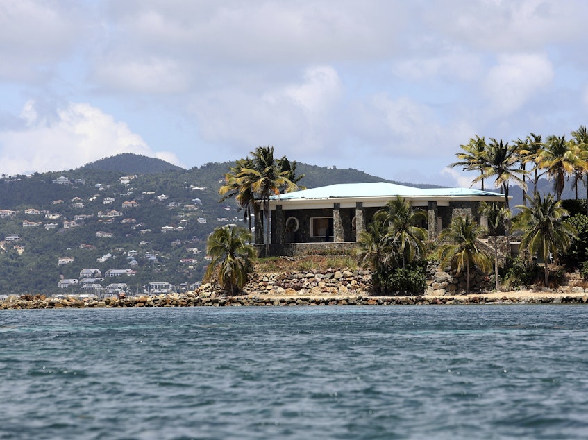 caption: A view of Jeffrey Epstein's stone mansion on Little St. James Island. Prosecutors in the Virgin Islands on Tuesday filed a civil lawsuit that accuses Epstein of human trafficking that victimized young women and children as young as 11 years old. Some of the alleged activity happened as recent as 2018.