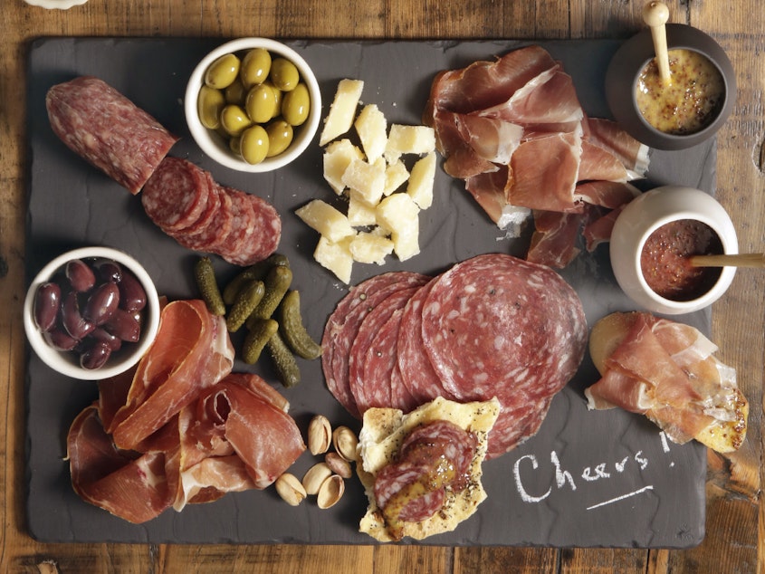caption: The Centers for Disease Control and Prevention is investigating two salmonella outbreaks that are tied to Italian meats like salami and prosciutto that are often used for charcuterie boards.