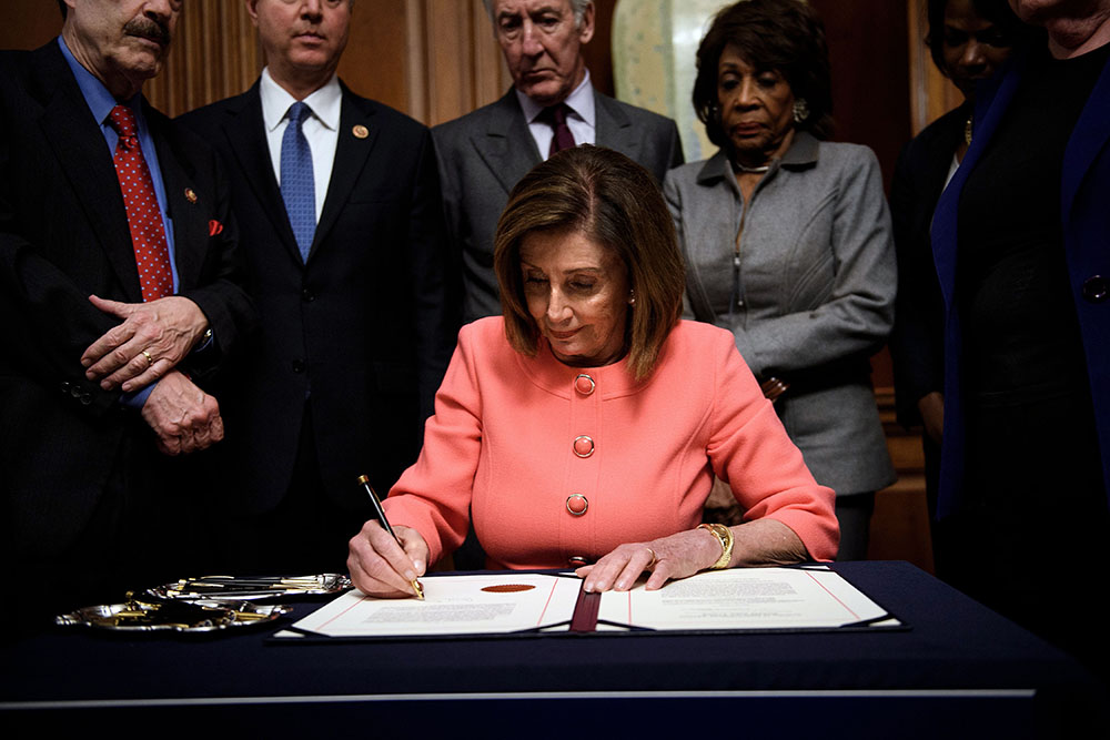 caption: The U.S. House of Representatives voted Wednesday to transmit articles of impeachment against President Donald Trump to the Senate, opening the way for the historic trial of the 45th president for abuse of power. (Brendan Smialowski/AFP via Getty Images)