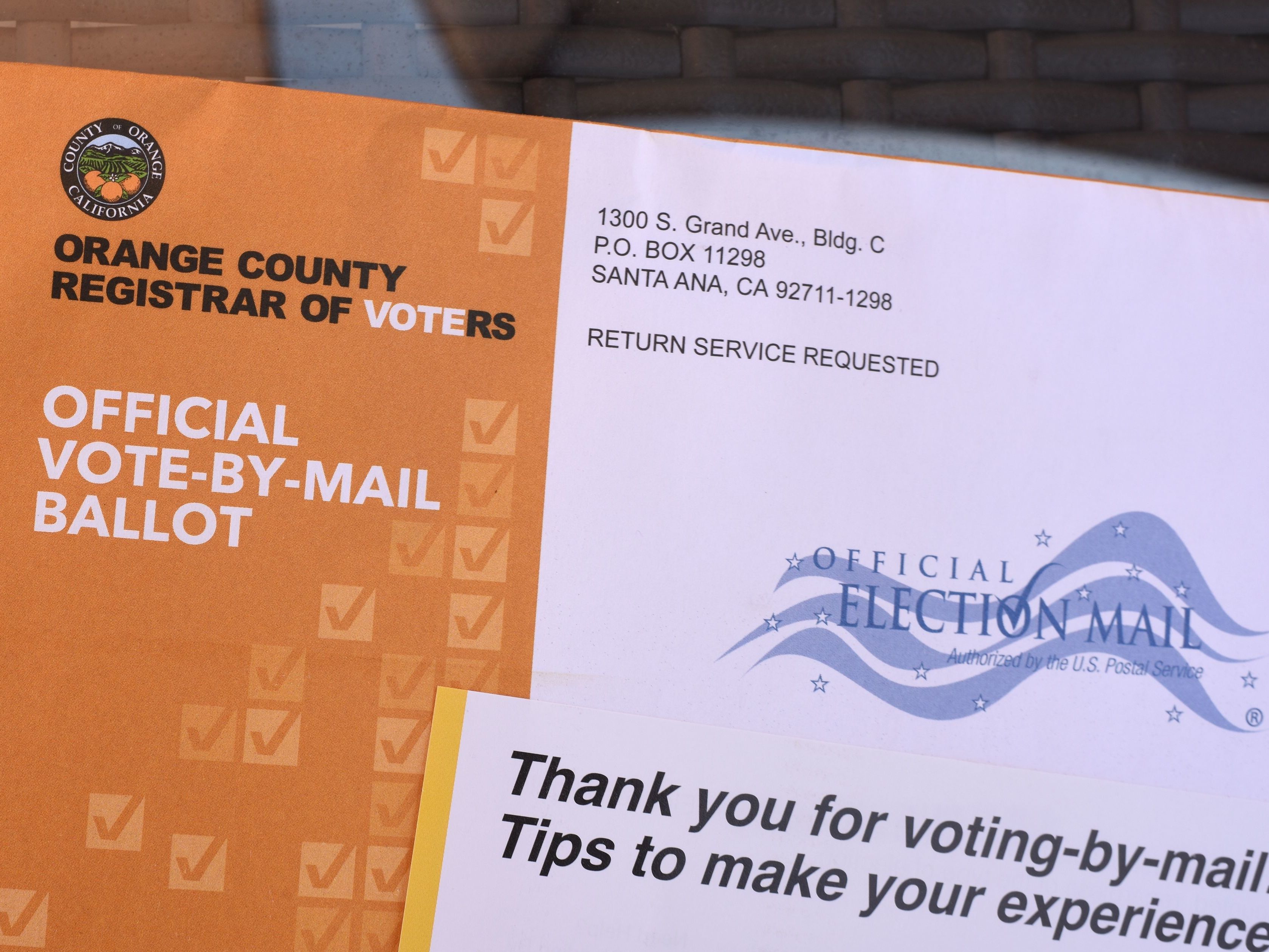 caption: A mail-in ballot is displayed in Laguna Niguel, Calif.