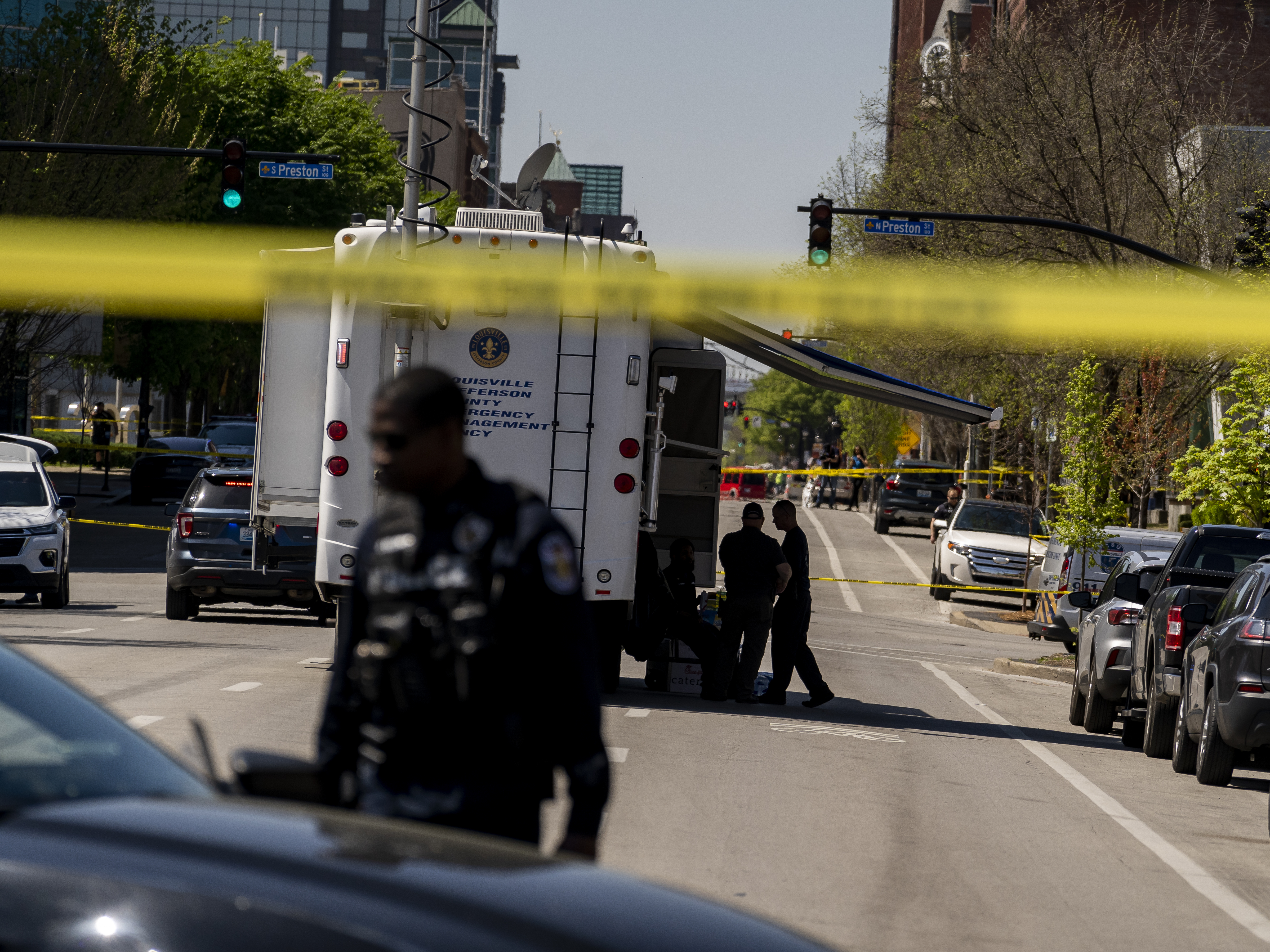 caption: Police tape surrounds the Old National Bank after a gunman opened fire on April 10, 2023 in Louisville, Kentucky.