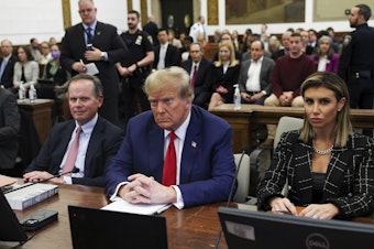 caption: Former U.S. President Donald Trump, with lawyers Christopher Kise and Alina Habba, attends the closing arguments in the Trump Organization civil fraud trial at New York State Supreme Court in the Manhattan borough of New York, Jan. 11, 2024.