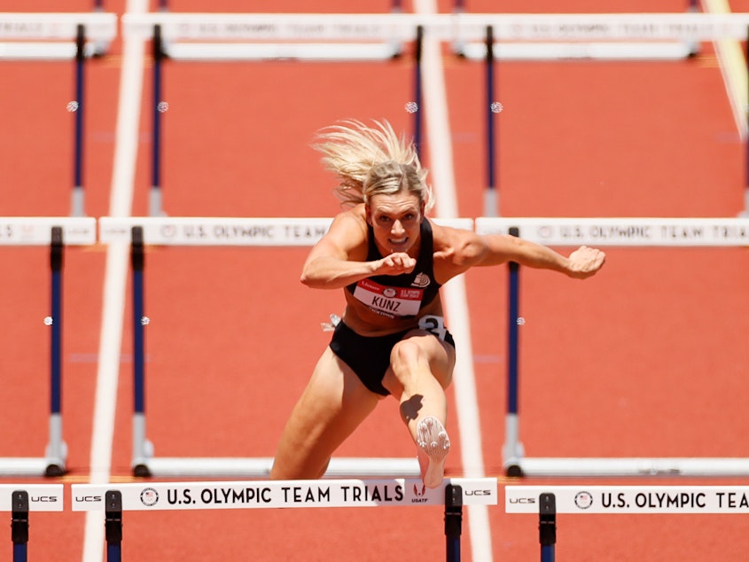 caption: Annie Kunz in the women's heptathlon 100-meter hurdles during the Olympic trials in Eugene, Ore., in June. Building her training regimen around recent findings from sex-specific sports medicine research has made a difference in her performance, says Kunz, who is competing at the Tokyo Olympics.
