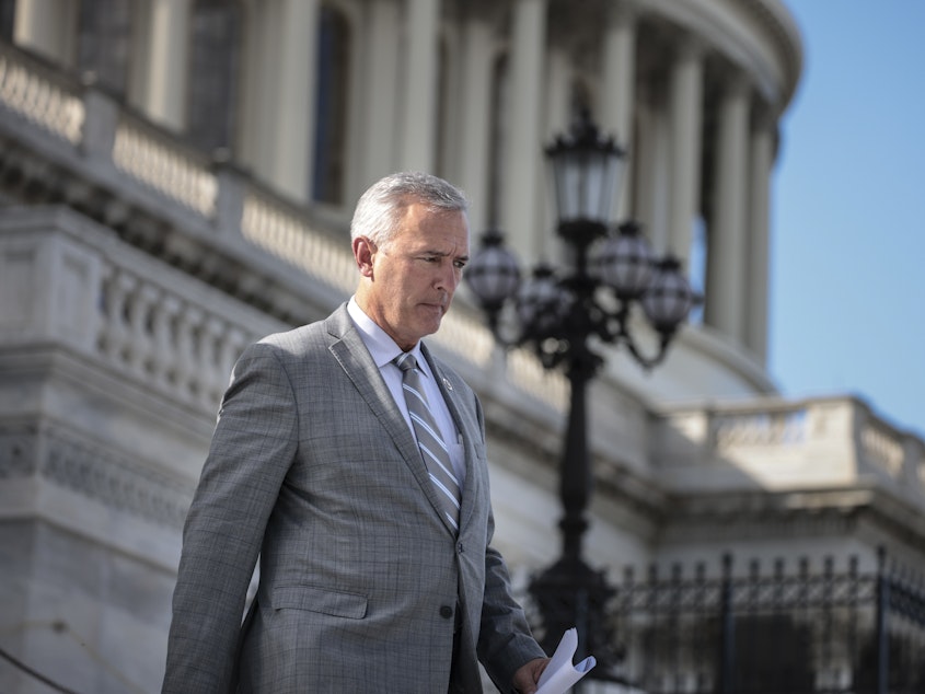 caption: Rep. John Katko, R-N.Y., walks down the steps of the U.S. Capitol on Sept. 23, 2021. Katko has announced his retirement from Congress.