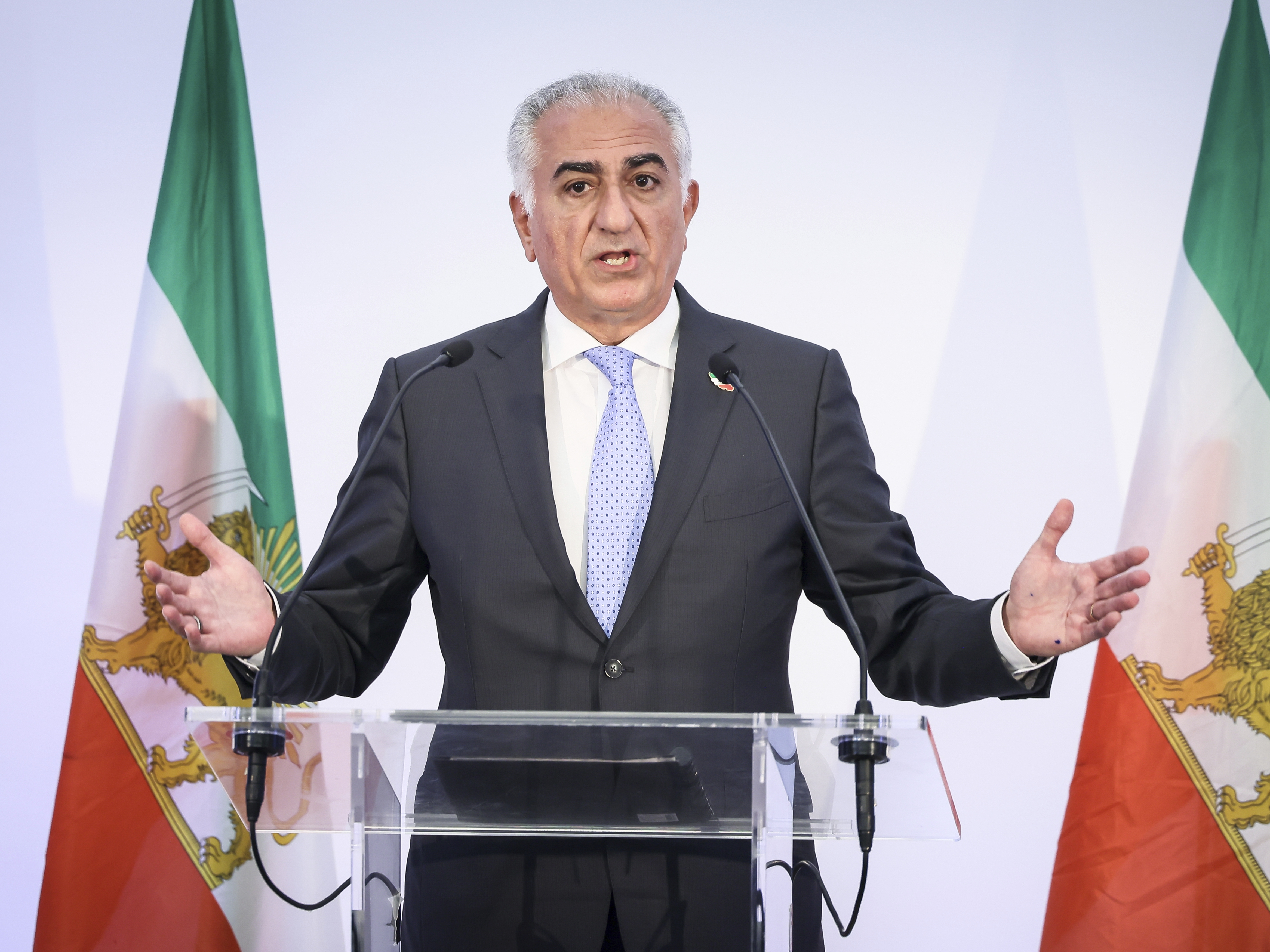 caption: Reza Pahlavi, the son of Iran's toppled Shah Mohammad Reza Pahlavi, speaks during a press conference, Monday, June 23, 2025 in Paris.