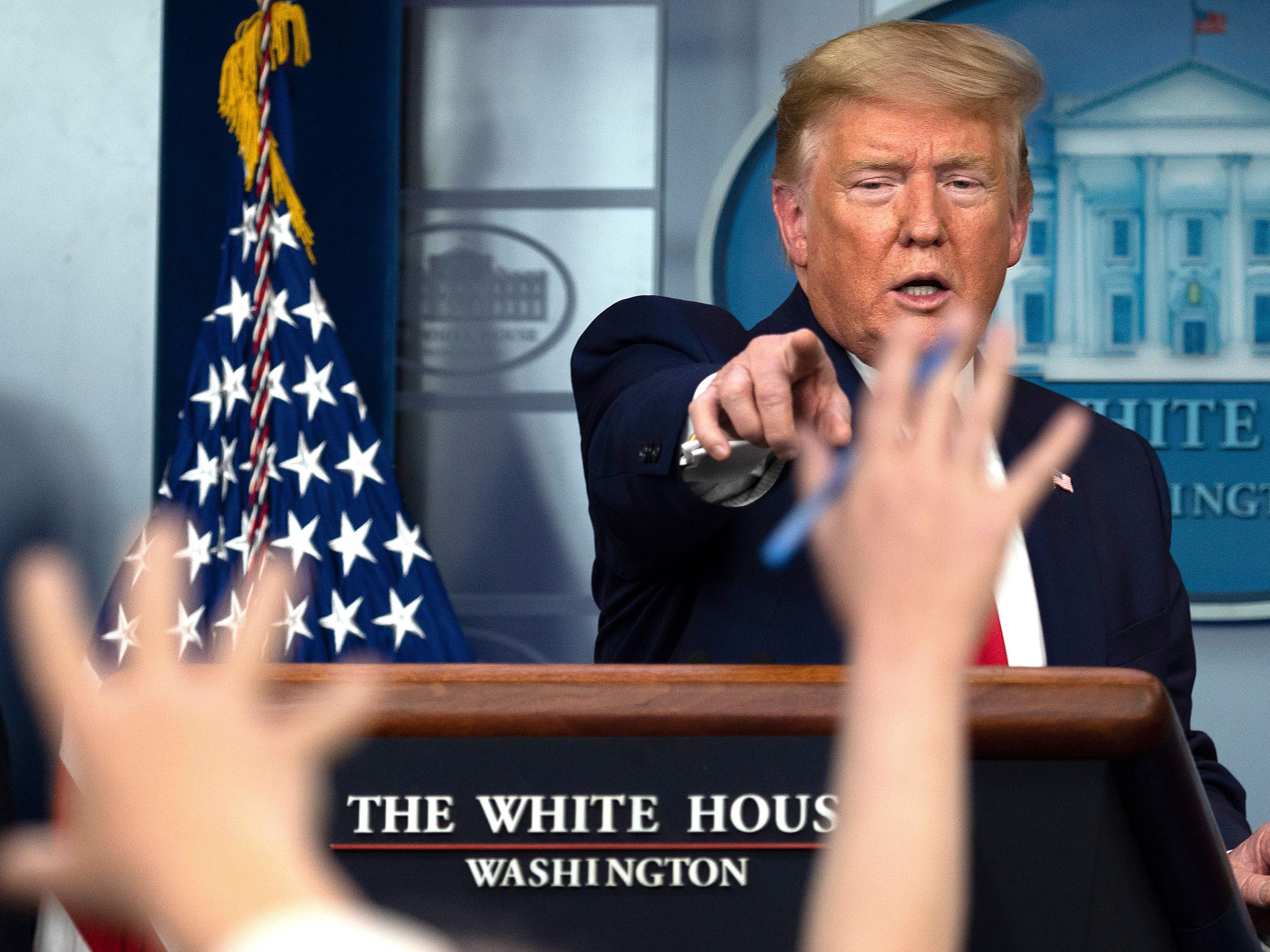 caption: President Trump speaks during the daily briefing on the novel coronavirus this week.