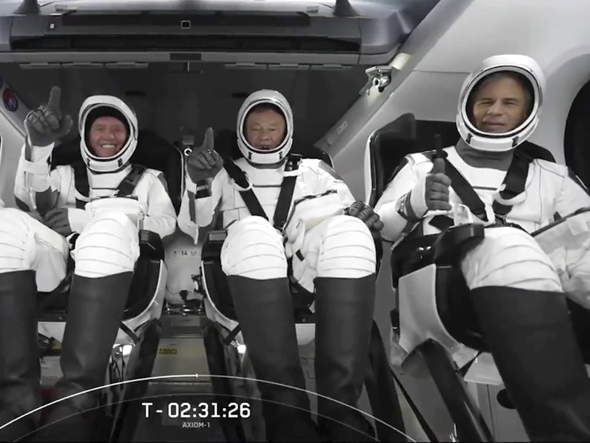 caption: The SpaceX crew is seated in the Dragon spacecraft on Friday, in Cape Canaveral, Fla., before their launch to the International Space Station.