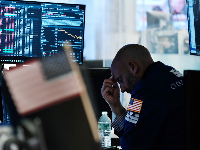 caption: Traders work on the floor of the New York Stock Exchange (NYSE) on Friday in New York City. Stocks slumped on Monday after a stronger-than-expected report on inflation, sending the S&P500 to a bear market.