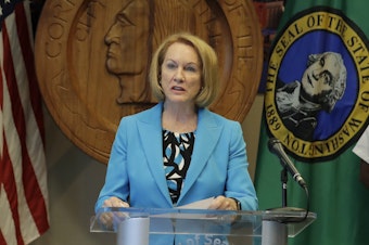 caption: Seattle Mayor Jenny Durkan speaks at a news conference during the summer of 2020. Durkan and the governor of Washington state told reporters that U.S. officers sent to protect federal buildings in the city have left.