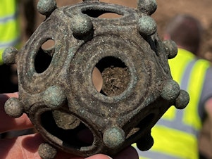 caption: The dodecahedron was found fully intact and in excellent condition.