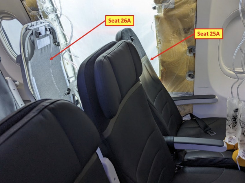 caption: A photo from the National Transportation Safety Board shows seats that were near the door plug expelled from a Boeing 737 Max 9 in flight. Seats 26A and 26B were unoccupied — a fact that helped prevent the incident from being worse, officials said.