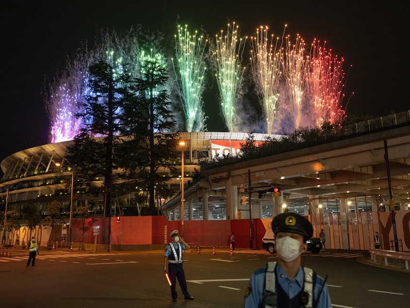 caption: Fireworks are seen above the Olympic Stadium on August 24, 2021 in Tokyo, Japan, during the opening ceremony of the Tokyo 2020 Paralympic Games.