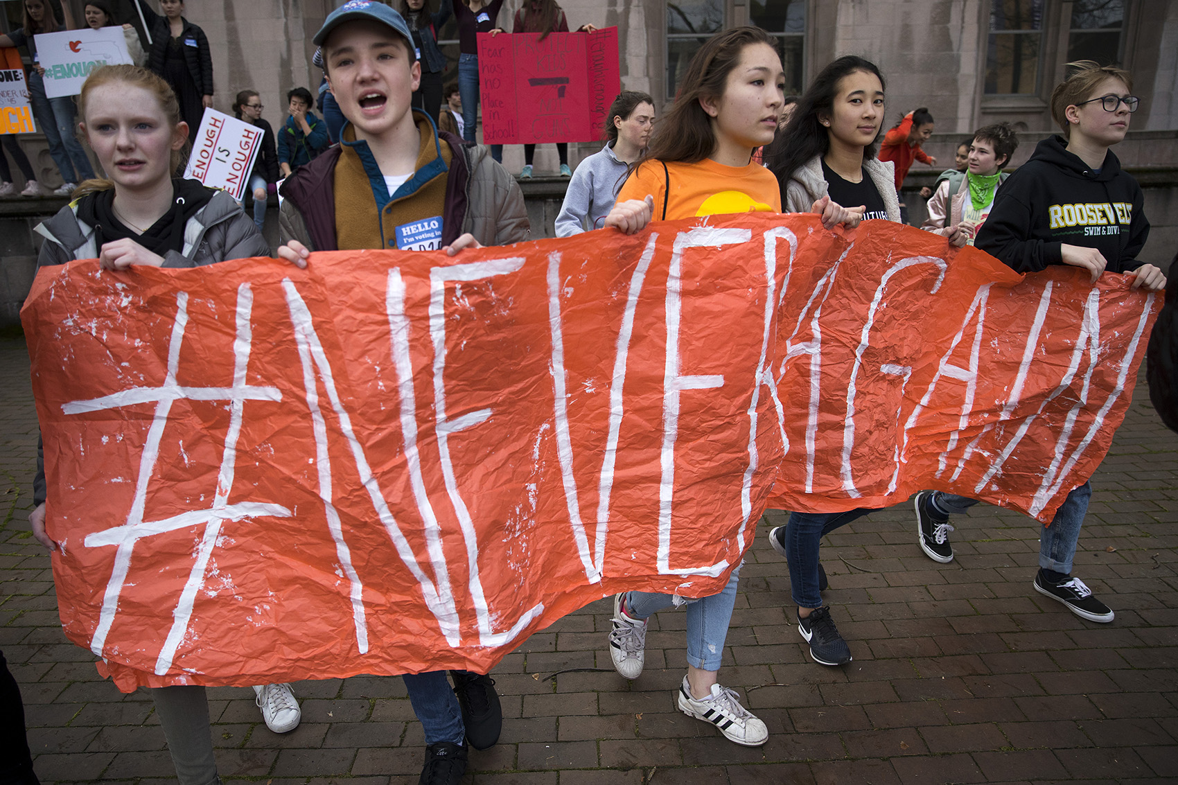 caption: University Prep students attend a walkout rally on Wednesday, March 14, 2018, at Red Square on the University of Washington campus in Seattle. 
