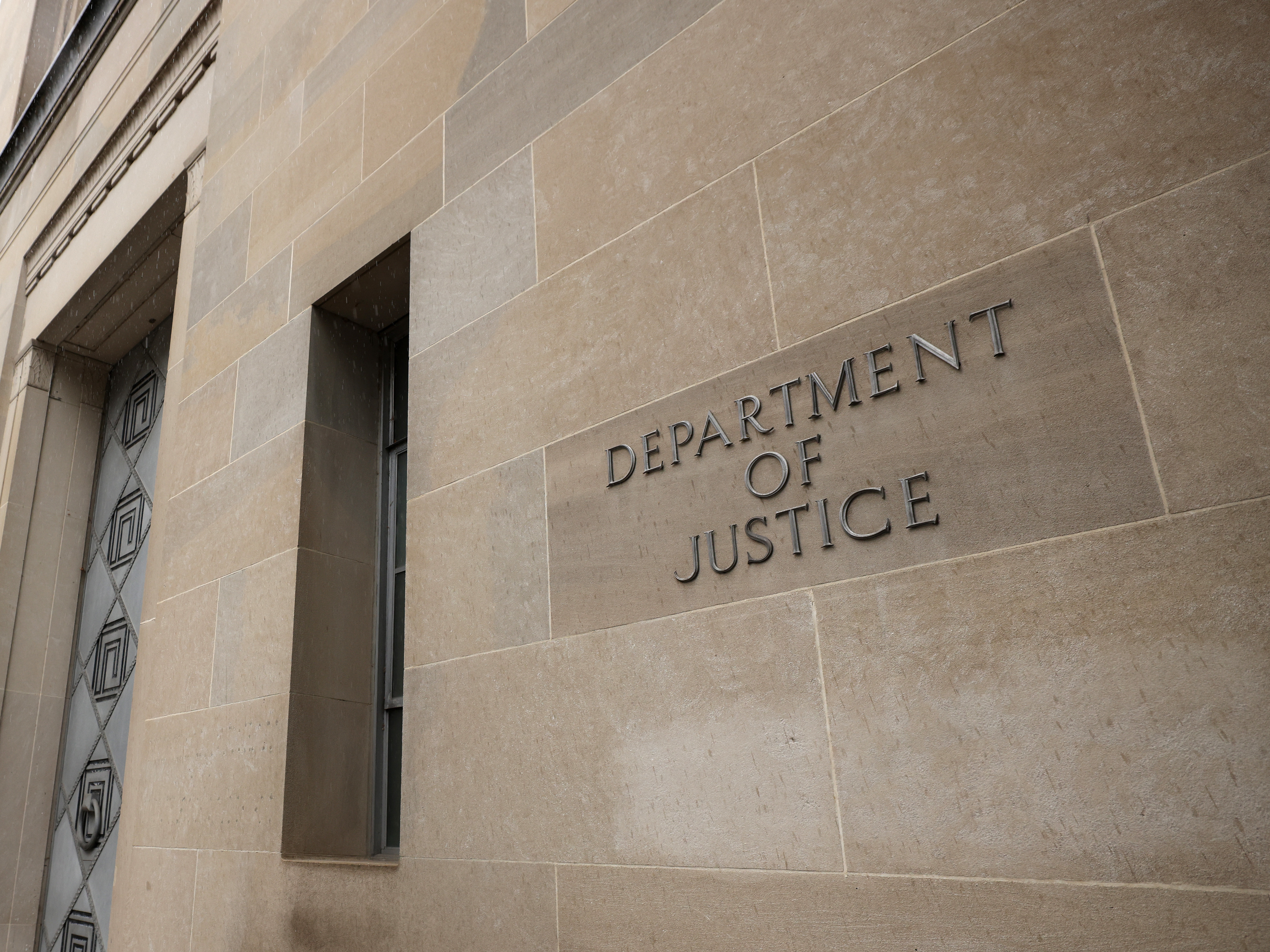 caption: The U.S. Department of Justice is seen on June 11 in Washington, D.C.