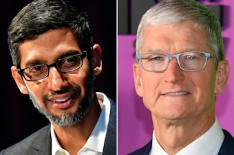 caption: The Justice Department says Google CEO Sundar Pichai (left) met privately with Apple chief Tim Cook in 2018 to discuss how their two companies could collaborate.