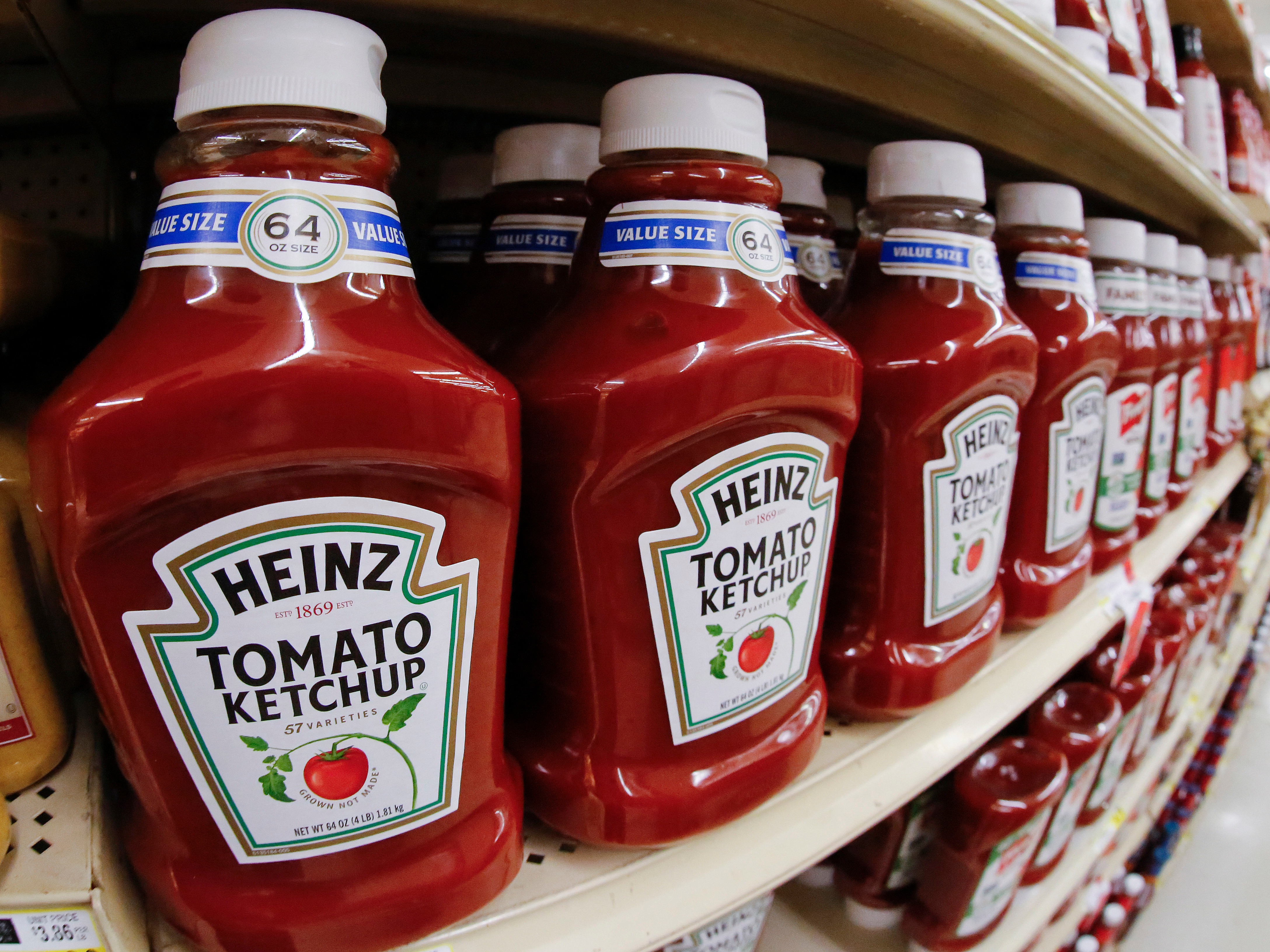 caption: Kraft Foods and Heinz merged into one company in 2015.