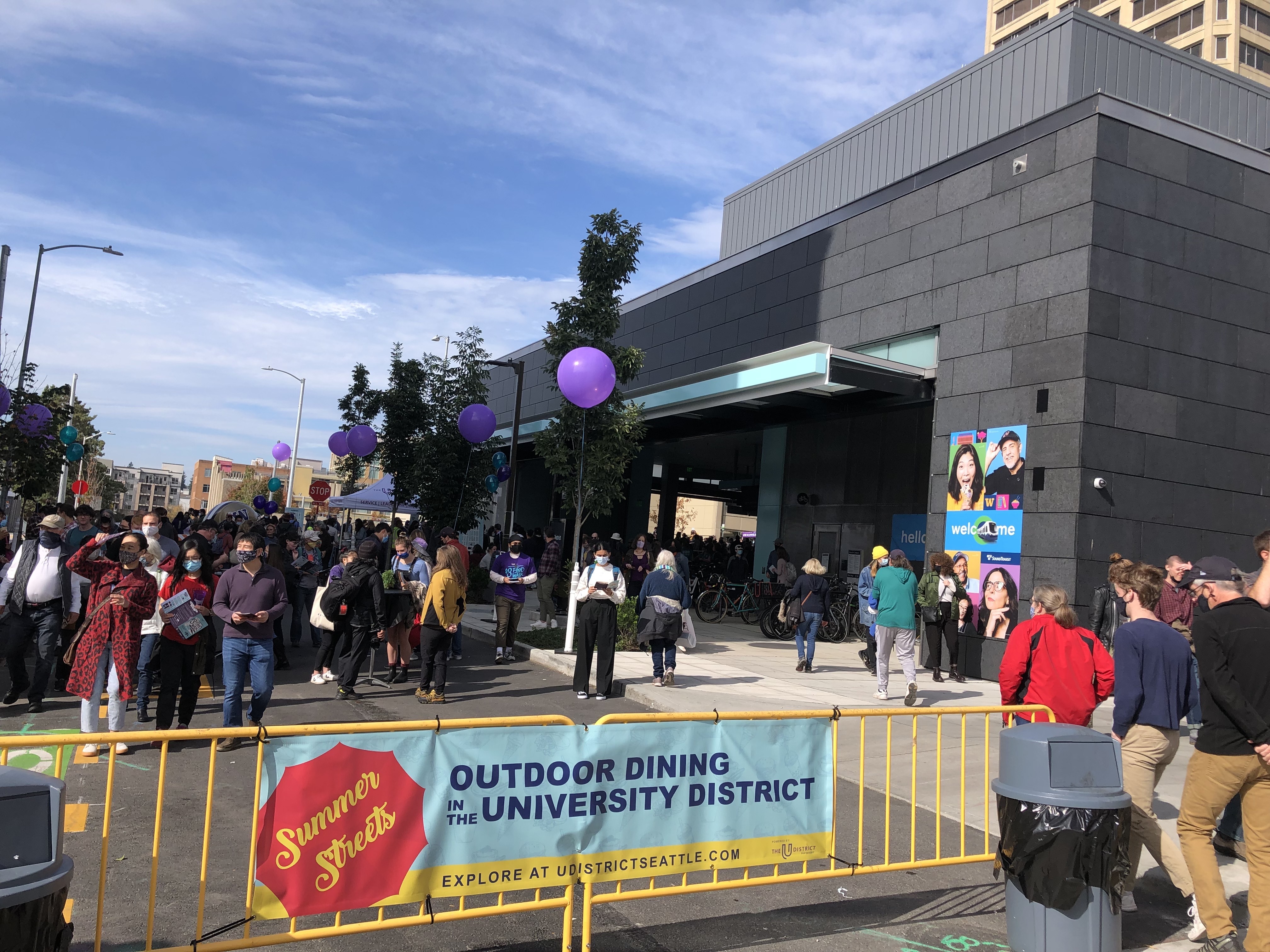 caption: People were eager to explore the new light rail extension through Seattle's University District, Roosevelt and Northgate neighborhoods on their first day open to the public: Saturday Oct. 2, 2021. 