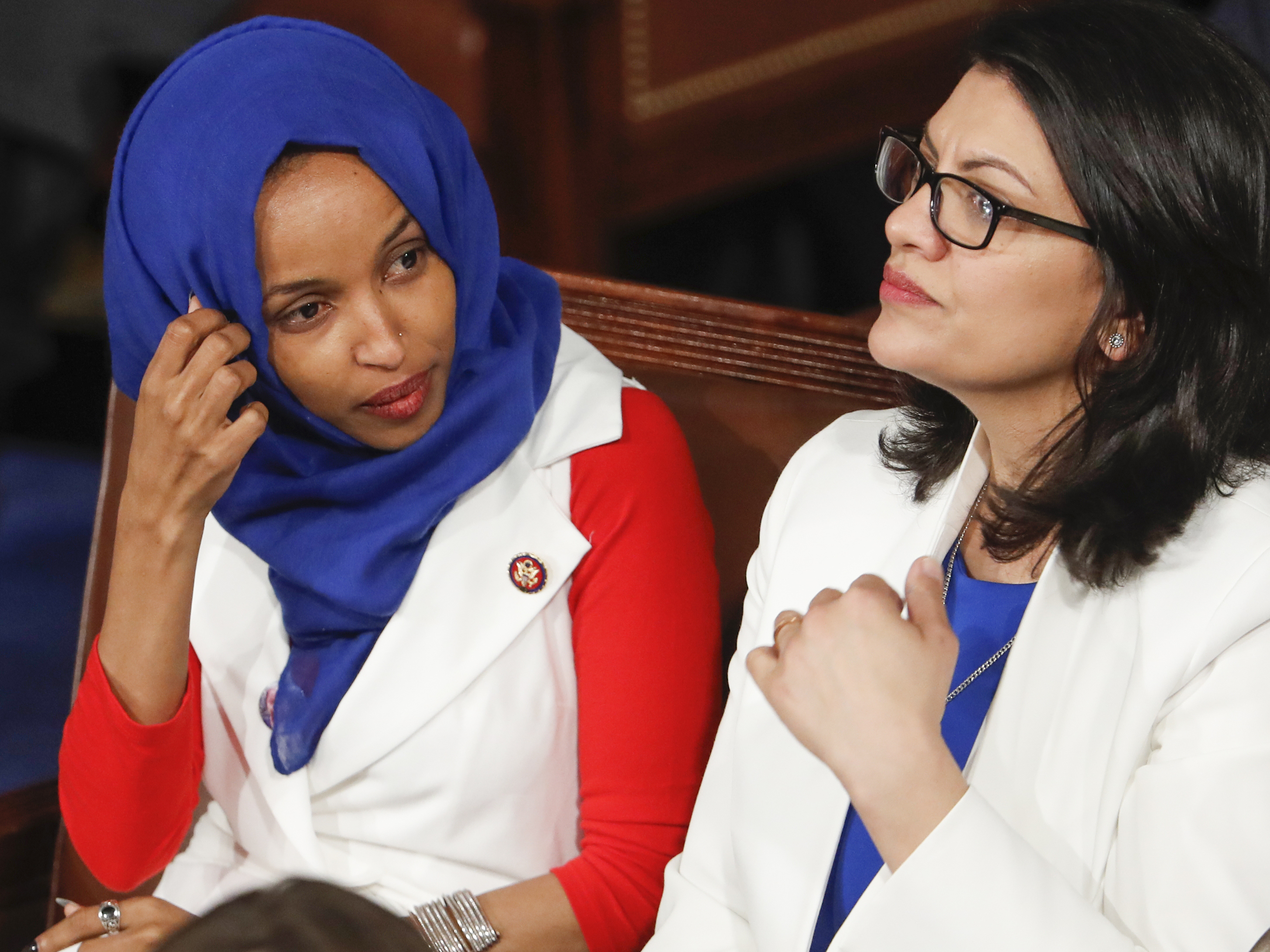 caption: Rep. Ilhan Omar, D-Minn., left, and Rep. Rashida Tlaib, D-Mich., pictured in February 2019, have been barred from visiting Israel and Palestinian territories by government officials.