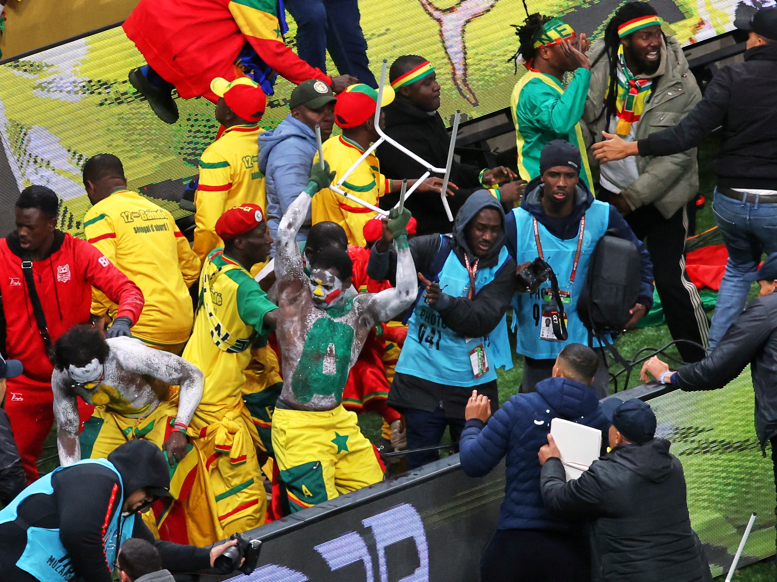 caption: Senegal supporters protest after a controversial penalty was awarded to Morocco during the Africa Cup of Nations final soccer match between Senegal and Morocco on Jan. 18, 2026, in Rabat, Morocco.