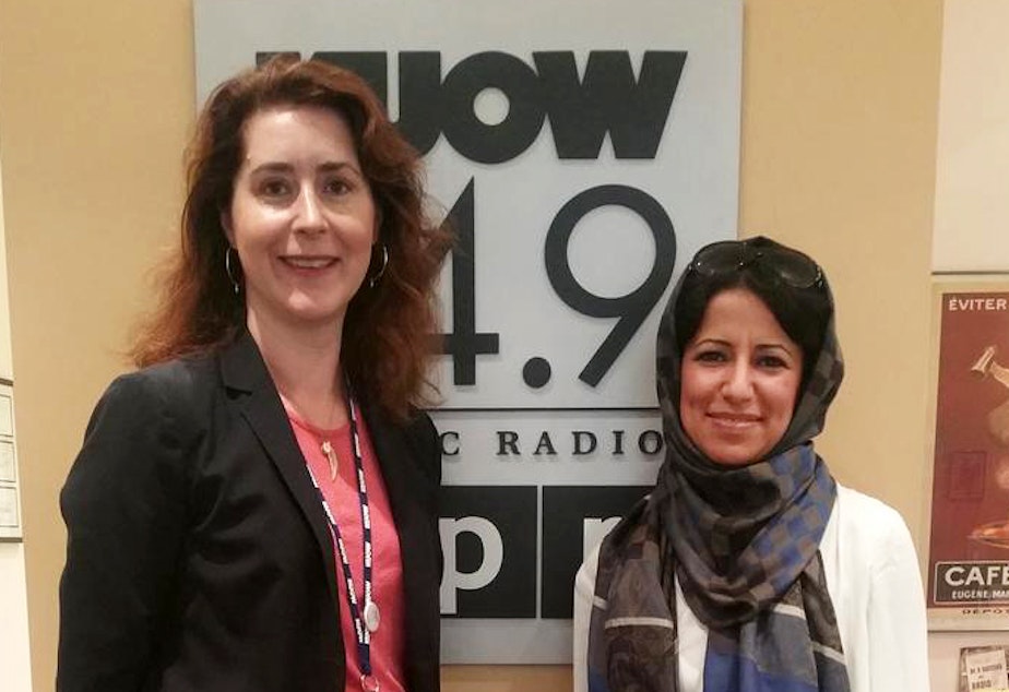 caption: Masar Altaie, right, with KUOW's Kim Malcolm.