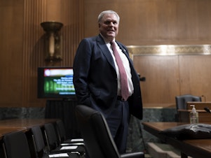 caption: Internal Revenue Service Commissioner Charles Rettig prepares to testify on the IRS budget before the Senate Finance Committee on April 7. On Thursday he'll face questions from a House committee on why the IRS audited two former FBI leaders who investigated Donald Trump's 2016 campaign.