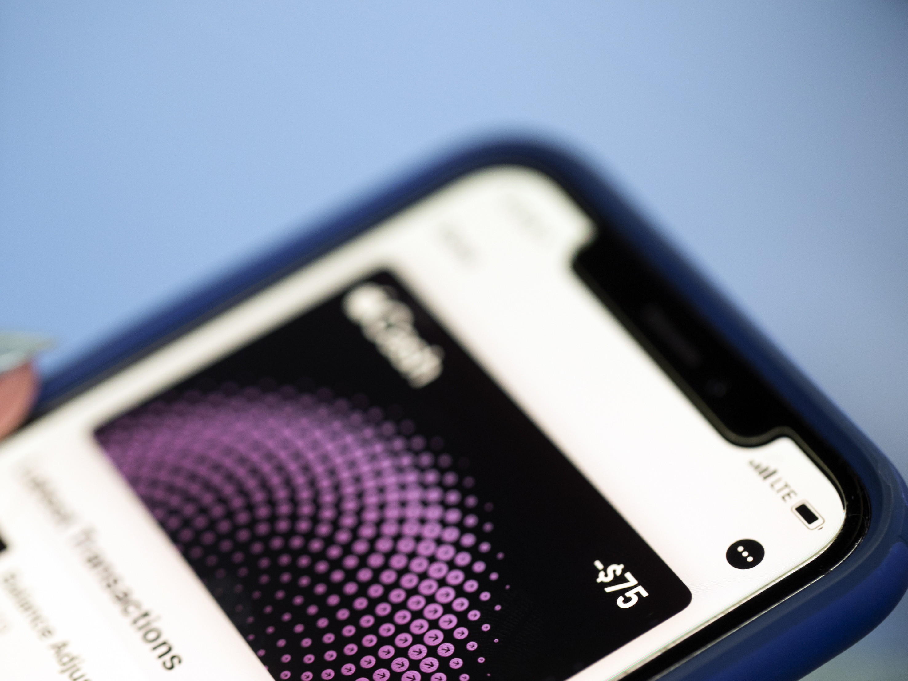 caption: This Oct. 8, 2019, photo shows the Apple Pay app on an iPhone in New York. Experts warn that digital wallet services like Apple Cash and Venmo are prime targets for scammers.