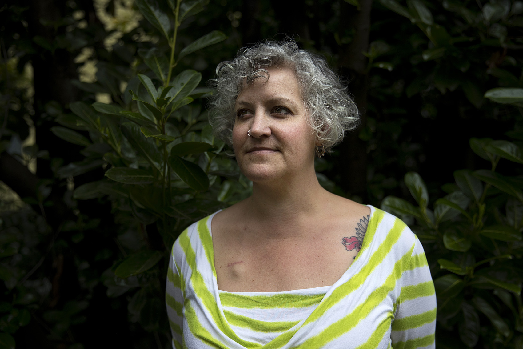 caption: Elthea Farr poses for a portrait on Sunday, April 7, 2019, outside of her home in Seattle. 