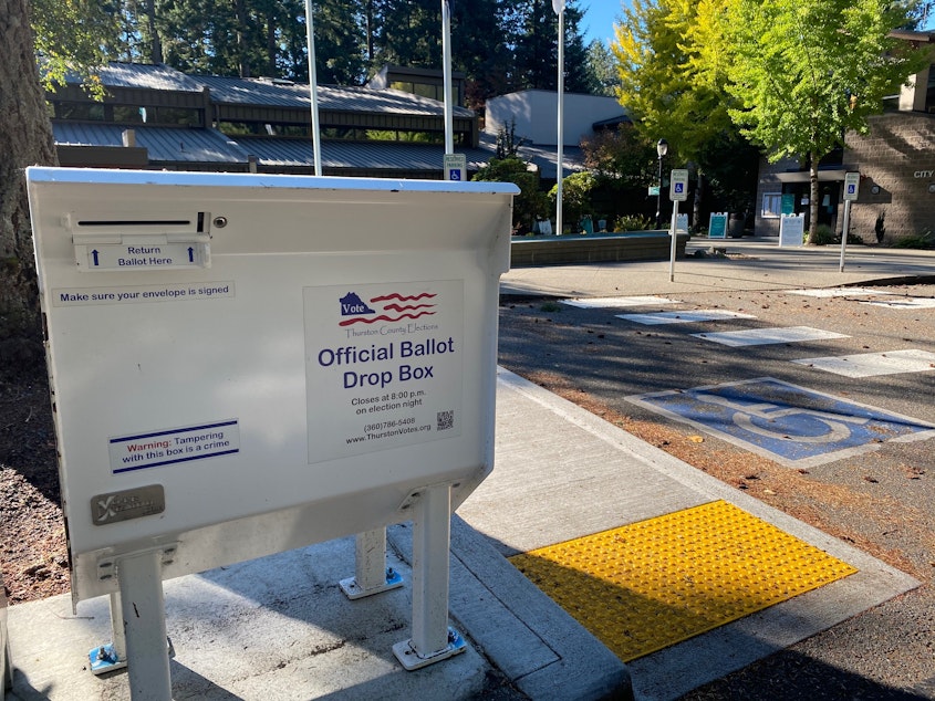 caption: Ballot boxes will close at 8 p.m. on election night in Washington. But ballots postmarked on or before Election Day will still be counted up to 20 days after the election.