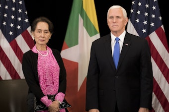 caption: Vice President Mike Pence and Myanmar State Counsellor Aung San Suu Kyi arrive for a bilateral meeting on the sidelines of the Association of Southeast Asian Nations (ASEAN) summit in Singapore on Wednesday.