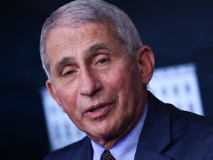 caption: Director of the National Institute of Allergy and Infectious Diseases Anthony Fauci speaks during a White House Coronavirus Task Force press briefing at the White House last month.