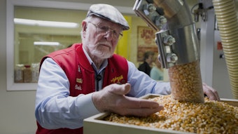 caption: Bob Moore, founder of Bob's Red Mill and Natural Foods, inspects grains at the company's facility in Milwaukie, Ore. The pioneering manufacturer of gluten-free products invests in whole grains as well as beans, seeds, nuts, dried fruits, spices and herbs.CREDIT: Natalie Behring/Bloomberg via Getty Images