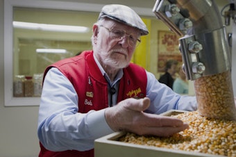 caption: Bob Moore, founder of Bob's Red Mill and Natural Foods, inspects grains at the company's facility in Milwaukie, Ore. The pioneering manufacturer of gluten-free products invests in whole grains as well as beans, seeds, nuts, dried fruits, spices and herbs.CREDIT: Natalie Behring/Bloomberg via Getty Images