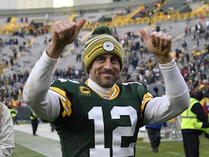 caption: NFL quarterback Aaron Rodgers is leaving the Green Bay Packers after 18 seasons. He'll be playing with the New York Jets in 2023.