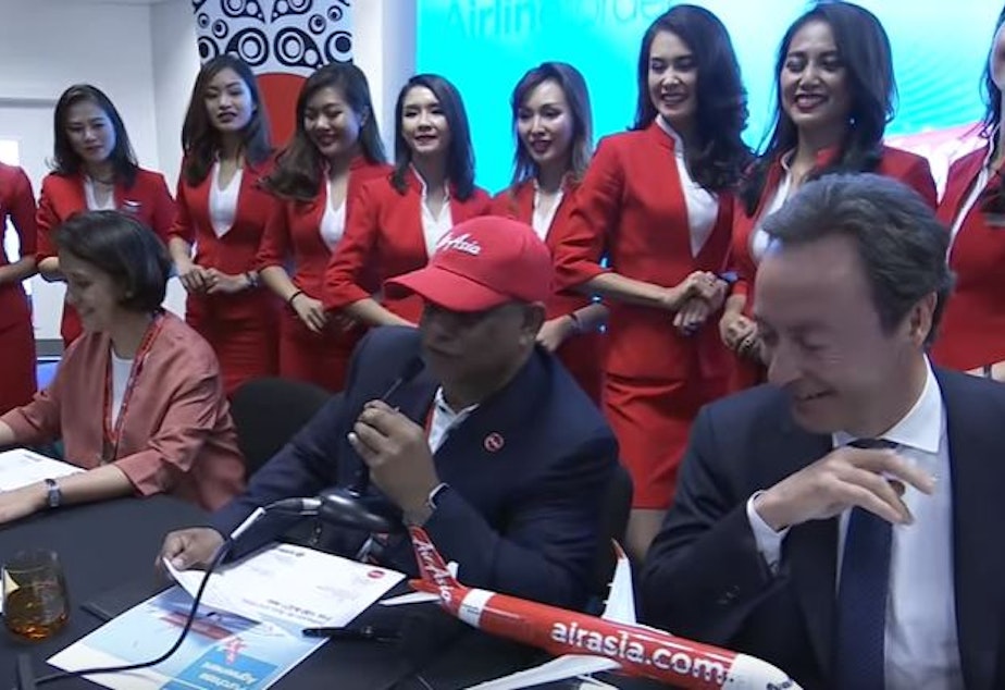 caption: AirAsia bought 100 Airbus A321neos at the Farnborough Airshow. Airbus has more than 1,200 orders for the new plane.