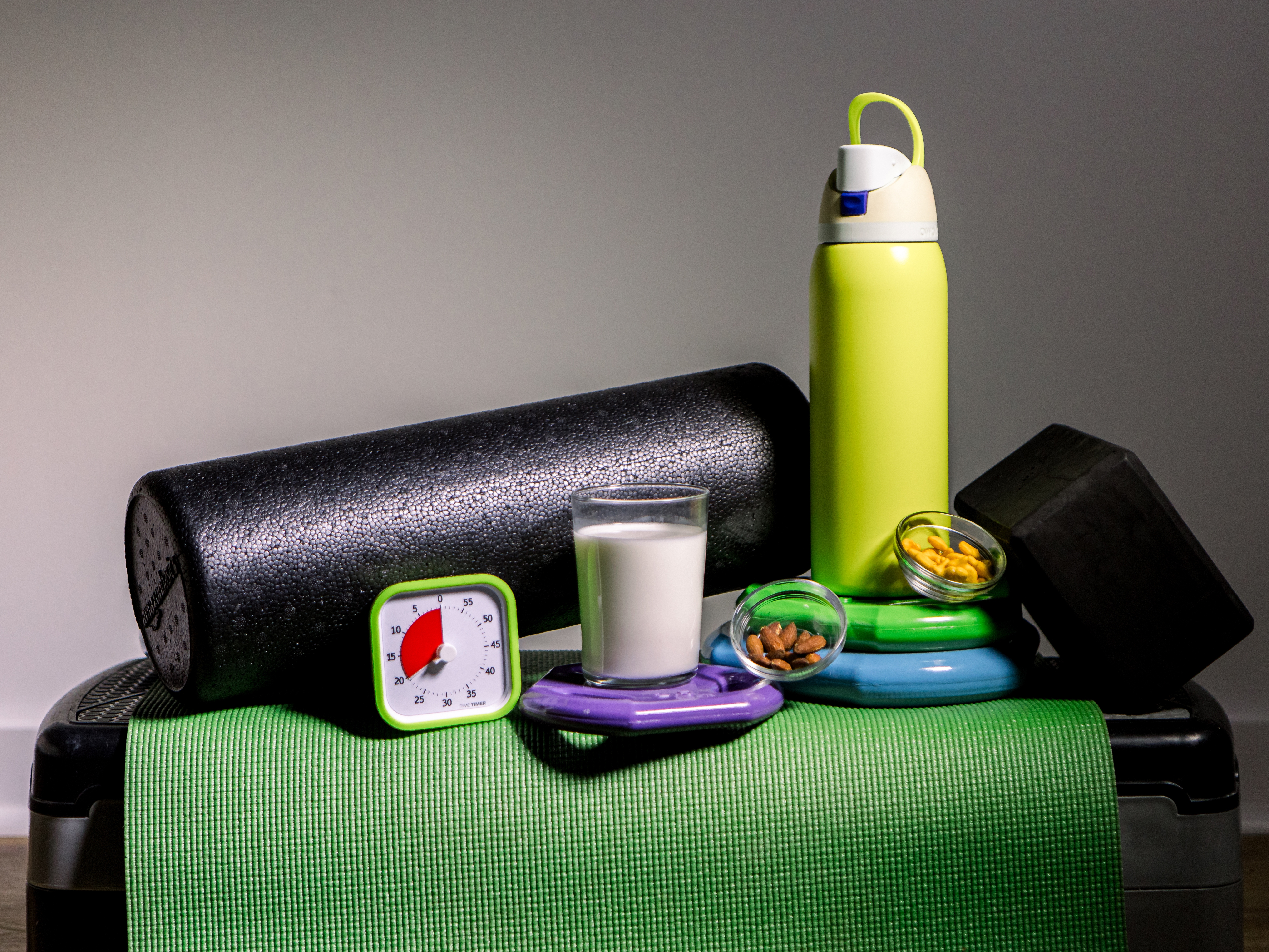 caption: A good post-workout routine includes a 10- to 15-minute cool down, stretching, foam rolling and a good protein snack.