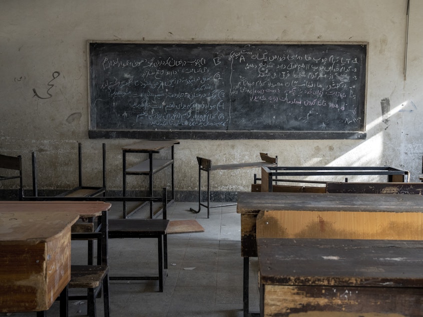 caption: A classroom that previously was used for girls sits empty in Kabul, Afghanistan, Thursday, Dec. 22, 2022. The country's Taliban rulers earlier this week ordered women nationwide to stop attending private and public universities effective immediately and until further notice.