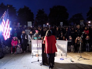 caption: Representative Pramila Jayapal addresses the Protect Mueller rally at Cal Anderson Park in Capitol Hill. 