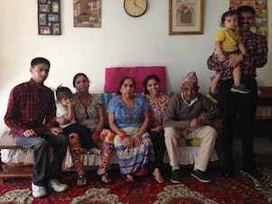 caption: The Pokhrel family moved to the U.S. from Bhutan. 