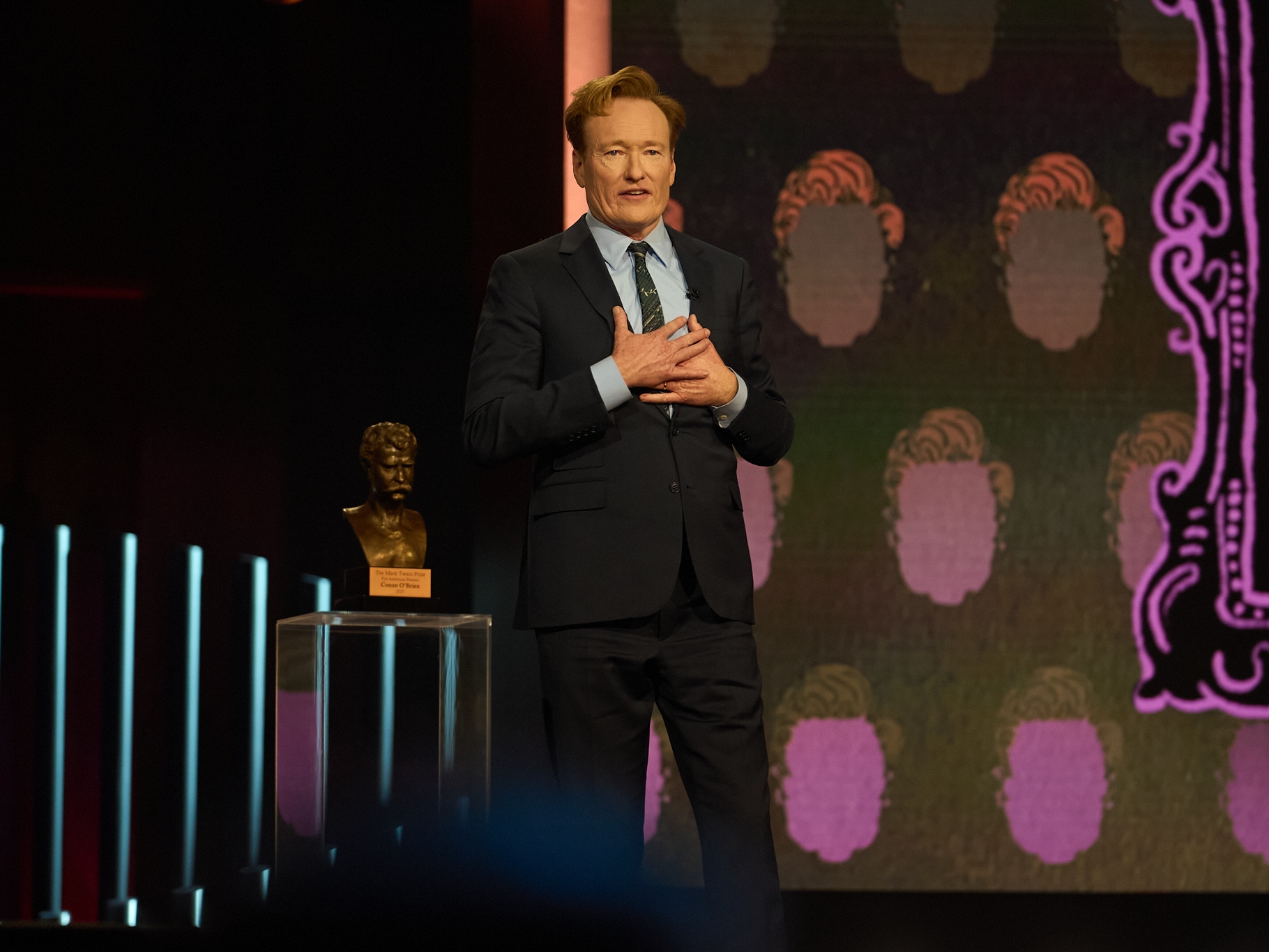 caption: Conan O'Brien accepts the Mark Twain Prize for American Humor at the Kennedy Center on March 23, 2025.