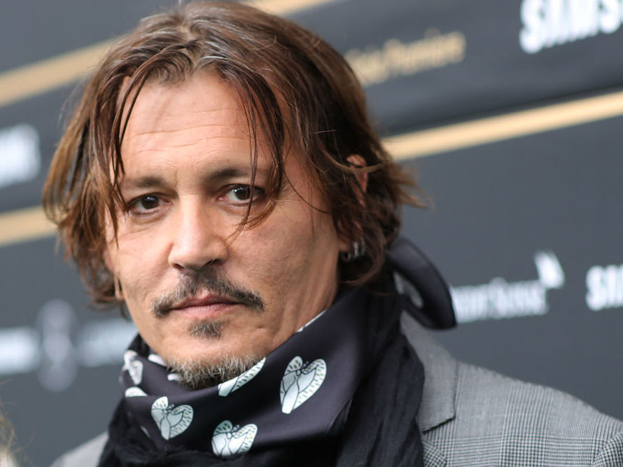 caption: Johnny Depp attends a film premiere in Zurich, Switzerland on Oct. 2.