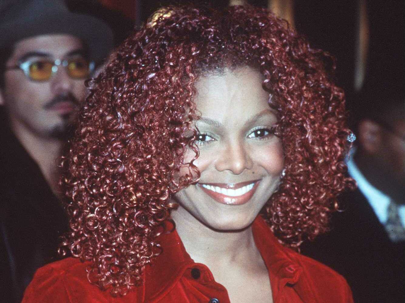 caption: Along with my mom's hair story, I was captured by the hair stories of the pop culture sirens who inspired me through magazine covers, music videos and images in CD booklets. This included Janet Jackson's burgundy curls during <em>The Velvet Rope</em> era, Toni Braxton's chic pixie cut, Brandy's range of microbraid styles, and the styles of LeToya, LaTavia, Kelly and Beyoncé from Destiny's Child