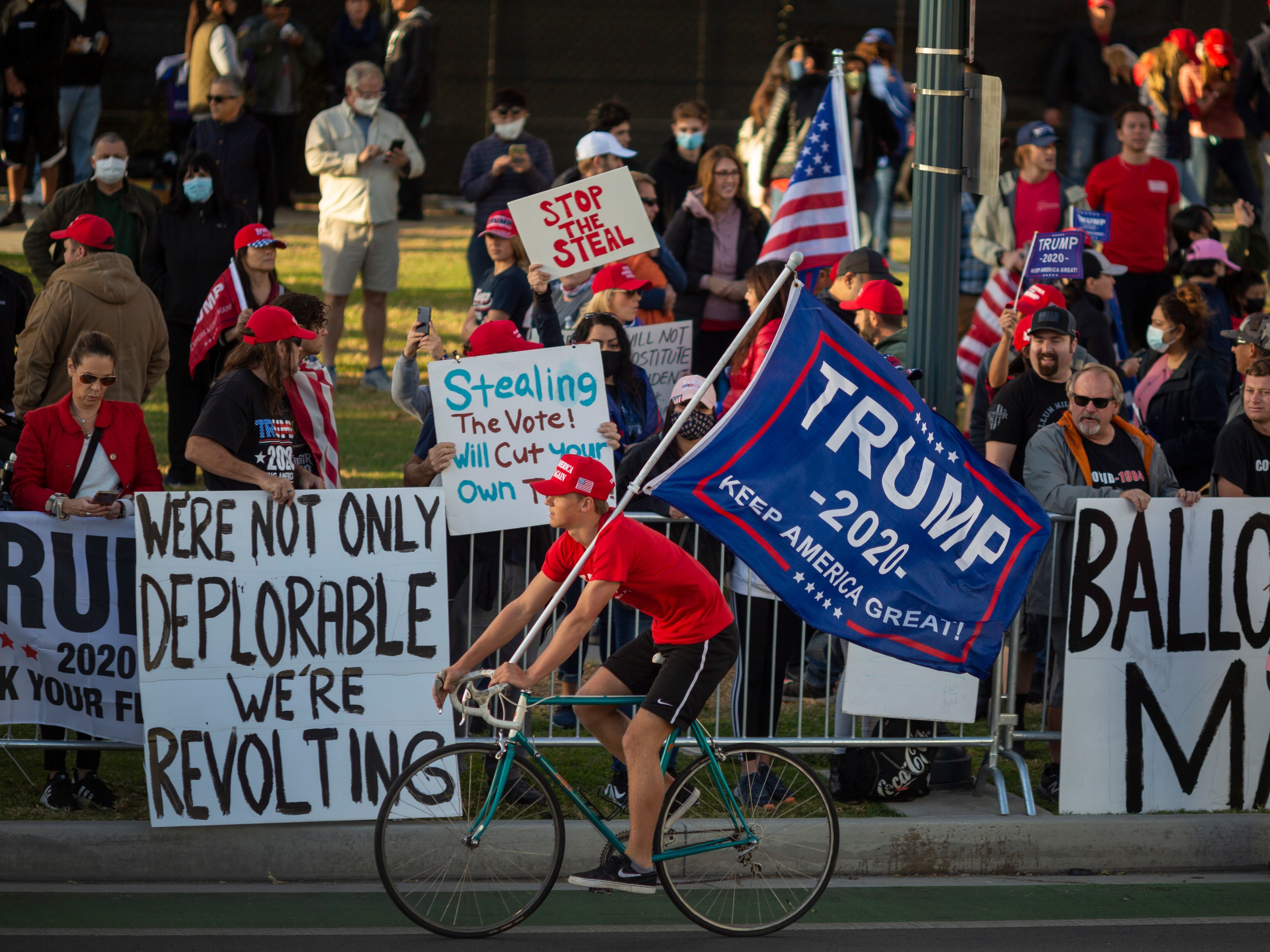 caption: Supporters of President Trump rally in Beverly Hills, Calif., Saturday after Democratic nominee Joe Biden was declared to have won the 2020 presidential election.
