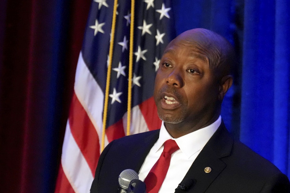 caption: Sen. Tim Scott, R-S.C., gives a speech at a Black History Month dinner hosted by the Charleston County GOP on Feb. 16, 2023, in Charleston, S.C. 