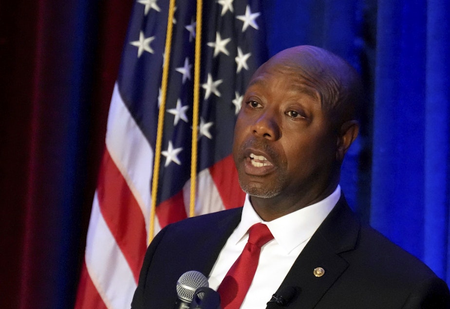 caption: Sen. Tim Scott, R-S.C., gives a speech at a Black History Month dinner hosted by the Charleston County GOP on Feb. 16, 2023, in Charleston, S.C. 