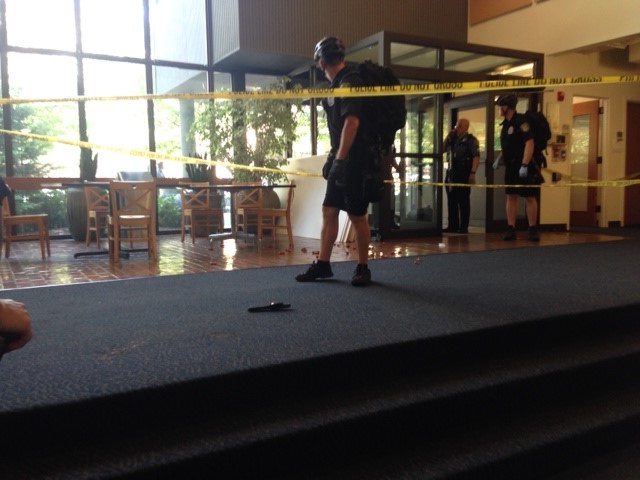 caption: Jillian Smith, a 20-year-old student at Seattle Pacific University, took this photo as she ran out of the Otto Miller building. As she ran out, police rushed in.    