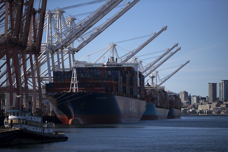 caption: The ZIM San Diego, far right, is shown on Thursday, June 17, 2021, at the Port of Seattle. 