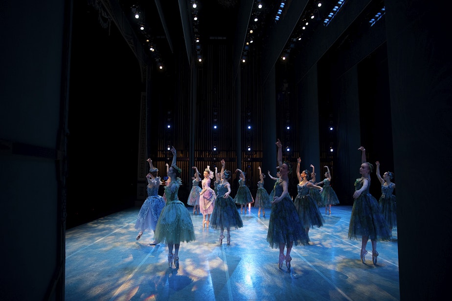 caption: Pacific Northwest Ballet dancers wait on stage for the curtain to go up during a performance of Cinderella on Saturday, February 1, 2020, at McCaw Hall in Seattle.