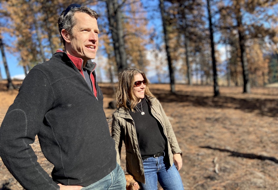 caption:  Peter and Shannon Polson with their dog, Bonnie. For six years, the Polsons thinned trees, chopped off limbs, and built a home resistant to fire to prepare their property for when the flames would come.